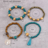 Four beaded bracelets with measurements on a textured surface