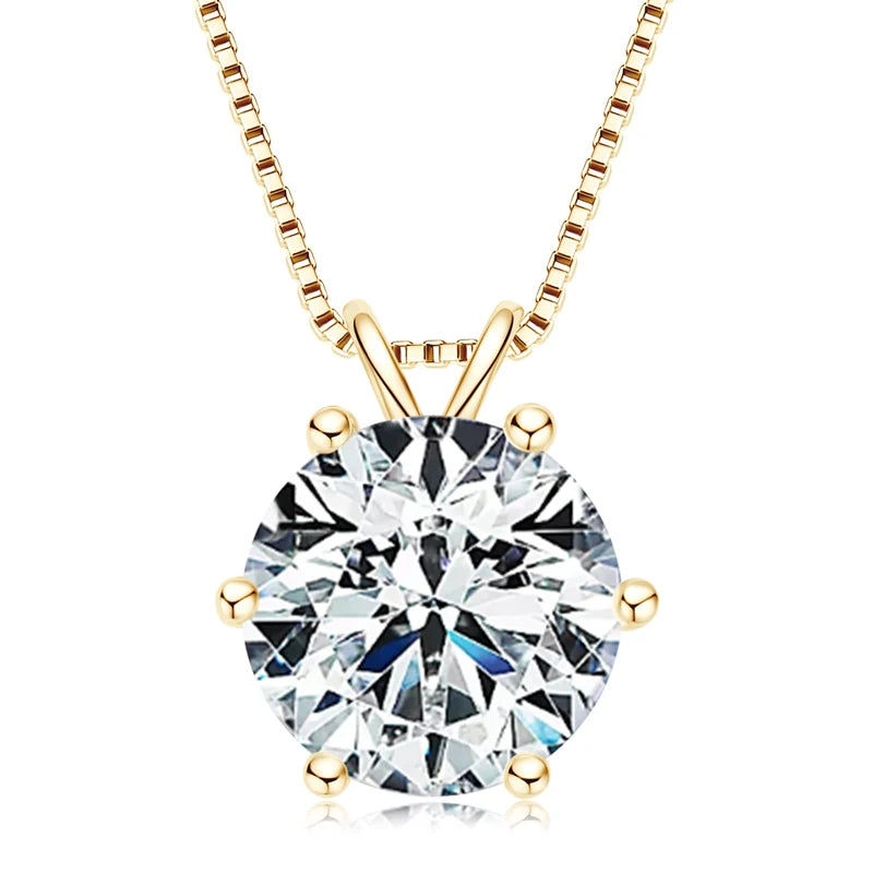 Gold necklace with a round diamond pendant on a white background