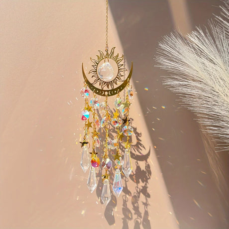 Decorative hanging ornament with crystals and celestial design on a beige background