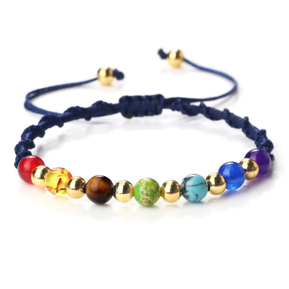 Colorful beaded bracelet with a navy cord on a white background