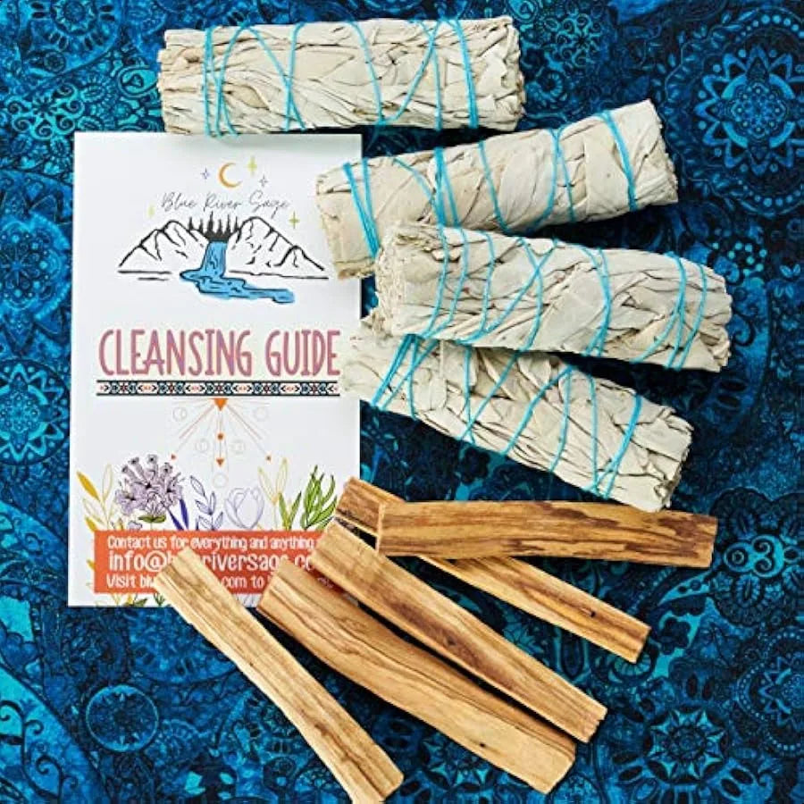 Set of smudge sticks and a cleansing guide on a blue patterned background