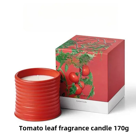 Tomato leaf fragrance candle in a red container with a matching box on a white background