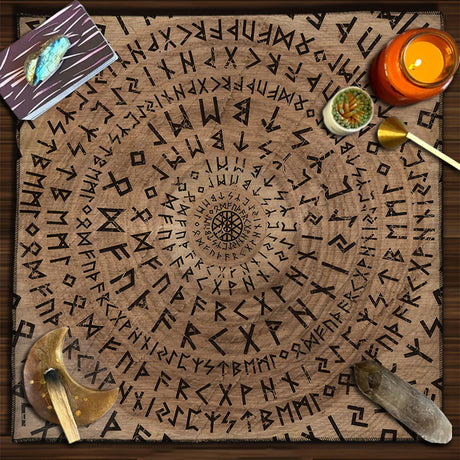 Decorative mat withRunes, candle, and tools on a wooden surface