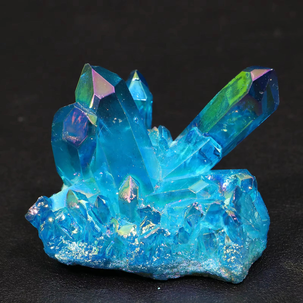 Blue crystal cluster on a black background