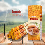 Sandalalo incense sticks packaging with incense stick and holder on a wooden surface