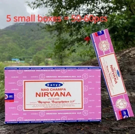 Satya Nirvana Nag Champa incense packaging with a scenic background