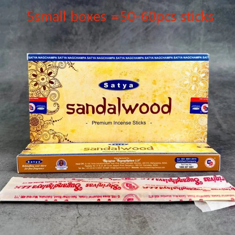 Satya sandalwood incense packaging on a gray background
