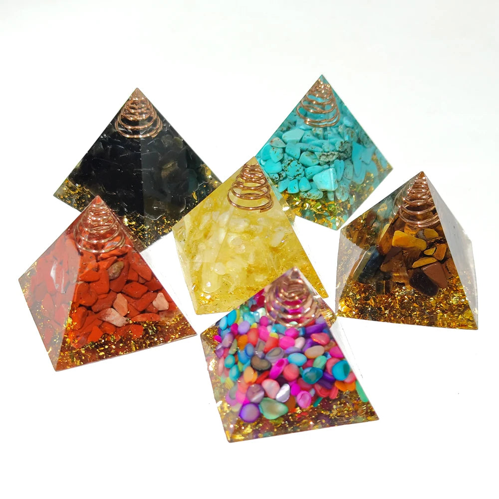 Set of colorful pyramid-shaped decorative items on a white background