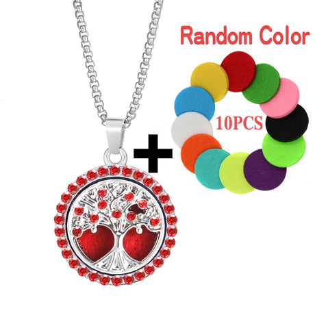Silver necklace with red heart and tree pendant, plus colorful round beads on a white background.