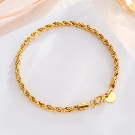 Gold bracelet on a white background
