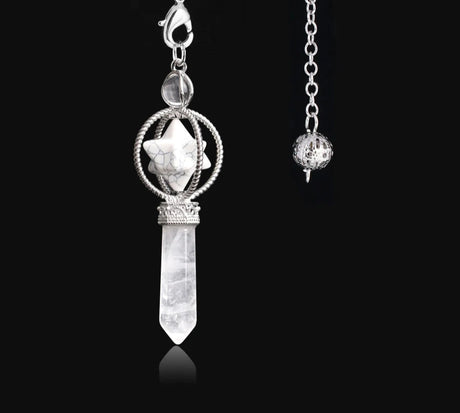 Crystal pendant necklace with silver chain on a black background