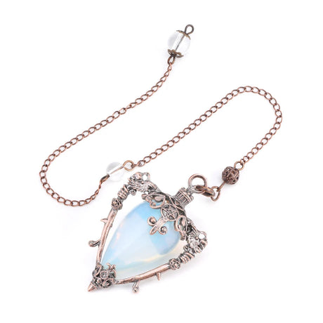 Jewelry pendant with a blue teardrop-shaped gemstone on a white background