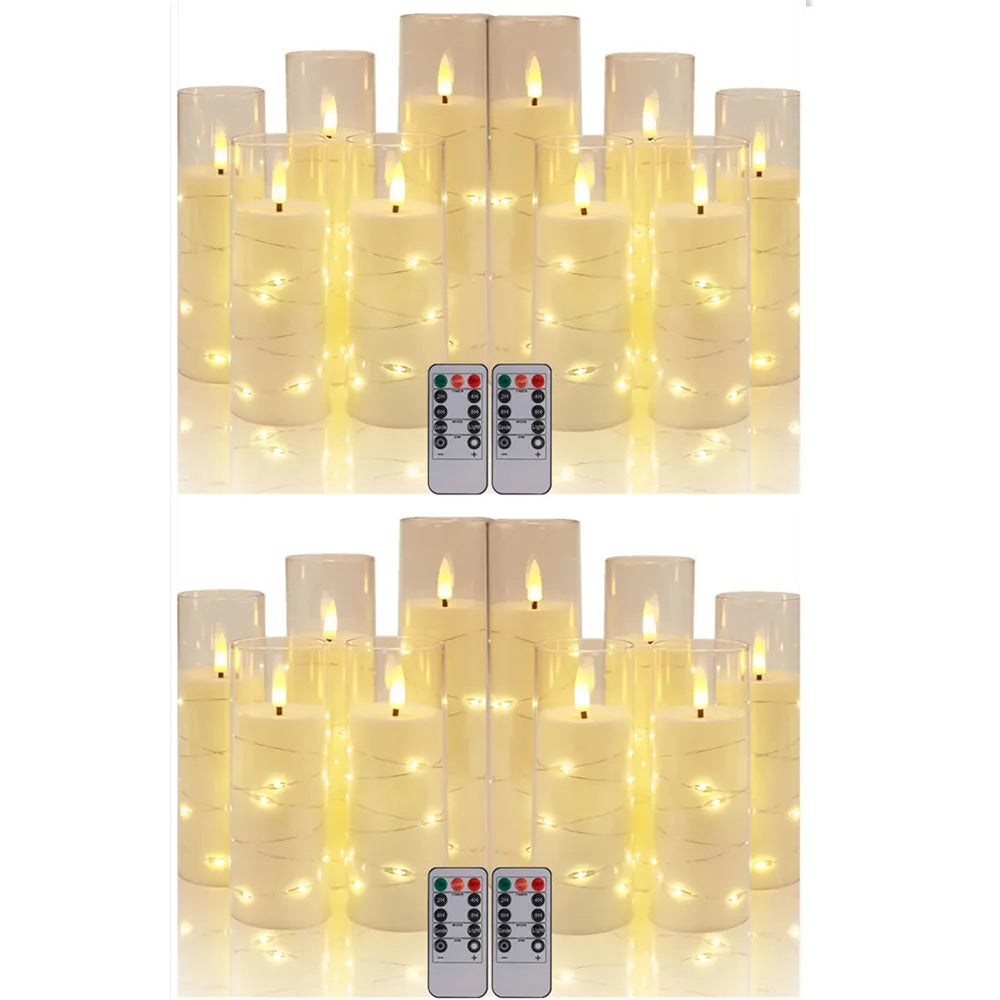 Set of LED candles with remote controls on a white background