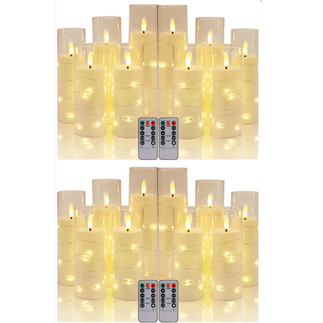 Set of LED candles with remote controls on a white background