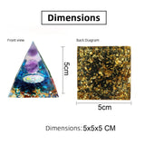 Triangular crystal orgone pyramid with dimensions labeled on a white background