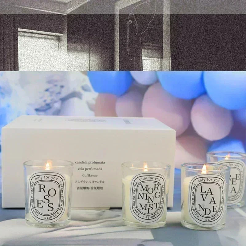 Three scented candles labeled 'Roses', 'Morning Mist', and 'Lavande' on a table with a blurred background.