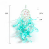 Turquoise dreamcatcher with measurements on a white background