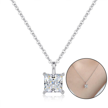 Silver necklace with a square-cut gemstone pendant on a white background