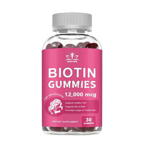 Bottle of biotin gummies with a pink label on a white background