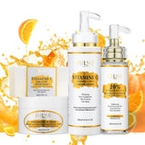 Set of skincare products with orange slices on a white background