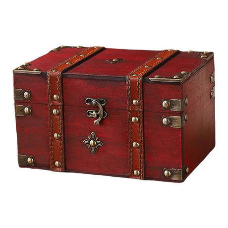 Red wooden treasure chest with brass accents on a white background