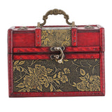 Decorative jewelry box with floral patterns and a red border on a white background