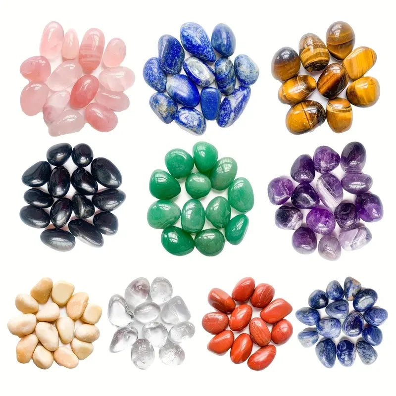 Collection of various colored stones arranged in a grid on a white background