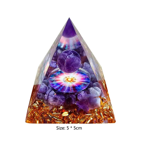 Crystal pyramid with purple stones and a colorful light at the base on a white background