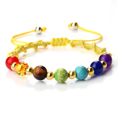 Colorful beaded bracelet with various stones on a white background