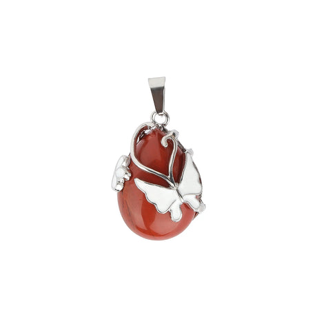 Red stone pendant with silver butterfly design on a white background