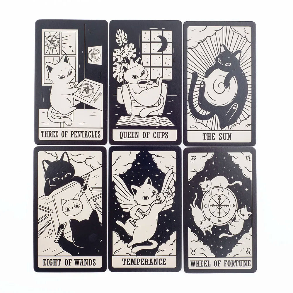 Set of tarot cards with cat illustrations and astrological symbols on a white background