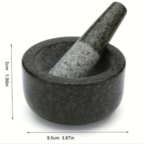 Stone mortar and pestle with dimensions indicated on a white background