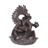 Decorative dragon sculpture on a white background