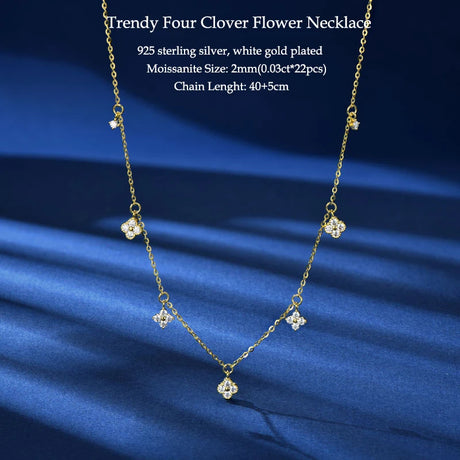 Trendy Four Clover Flower Necklace on a blue fabric background
