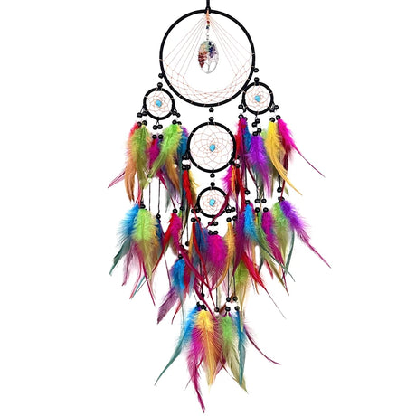 Colorful dreamcatcher with feathers on a white background
