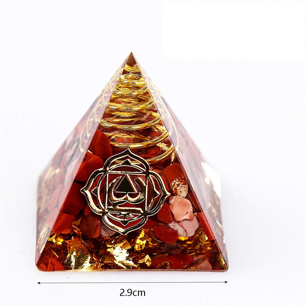 Pyramid-shaped object with a central emblem and embedded materials, shown on a white background.