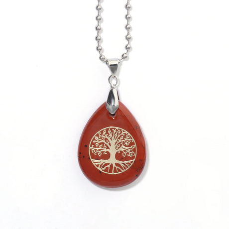 Red teardrop-shaped pendant with tree of life design on a white background