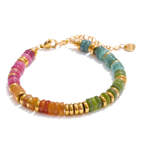 Multicolored beaded bracelet with gold accents on a white background