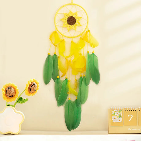Decorative dreamcatcher with sunflower design on a beige wall.