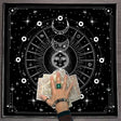 Person holding tarot cards with a black and white astrological design in the background