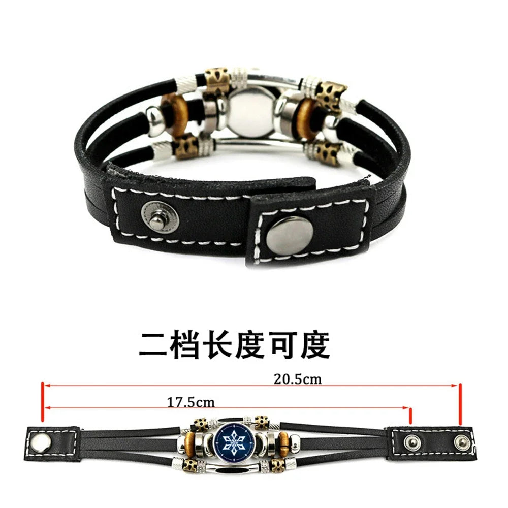 Black leather bracelet with decorative elements and measurements on a white background