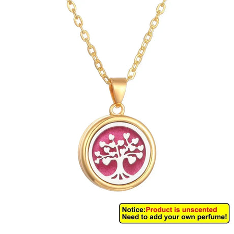 Gold necklace with a pink tree-of-life pendant on a white background