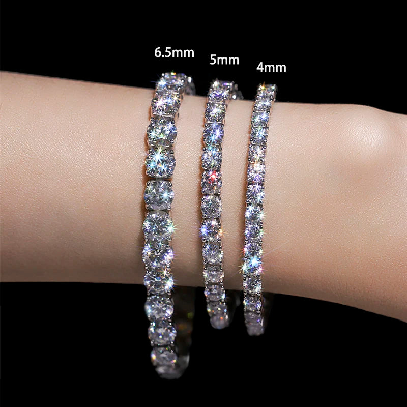 Three diamond bracelets of different widths on a wrist with size labels.