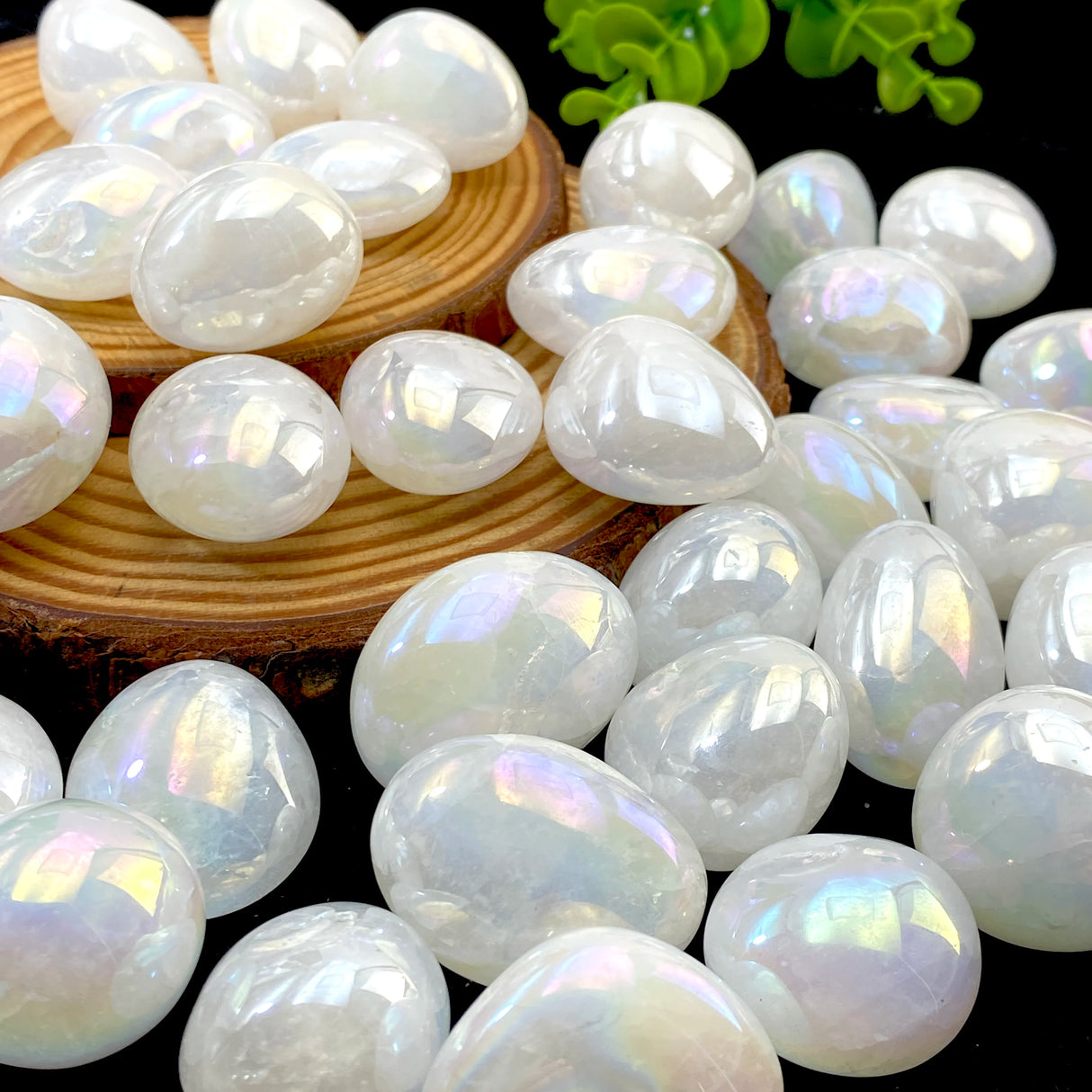 Opal stones with a wooden bowl on a dark background