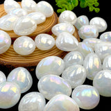 Opal stones with a wooden bowl on a dark background