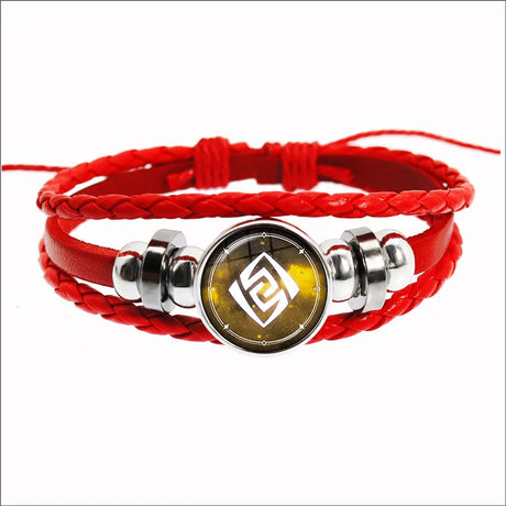 Red braided bracelet with silver beads and a central emblem on a white background