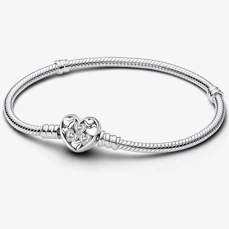 Silver bracelet with a heart-shaped clasp on a white background