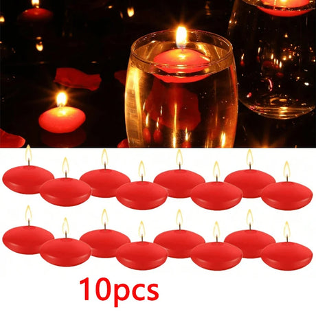 Red floating candles with a glass of wine in the background