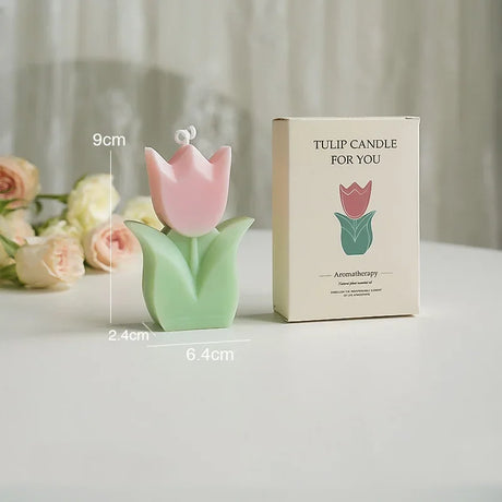 Tulip-shaped candle with dimensions and packaging on a neutral background