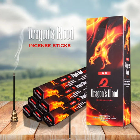 Dragon's Blood incense sticks packaging with incense sticks on a wooden surface and blurred natural background
